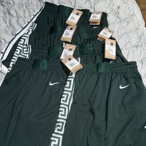 7 Pair L Nike Kids MSU Athletic Shorts- retail $50 each. All have tags except 1.